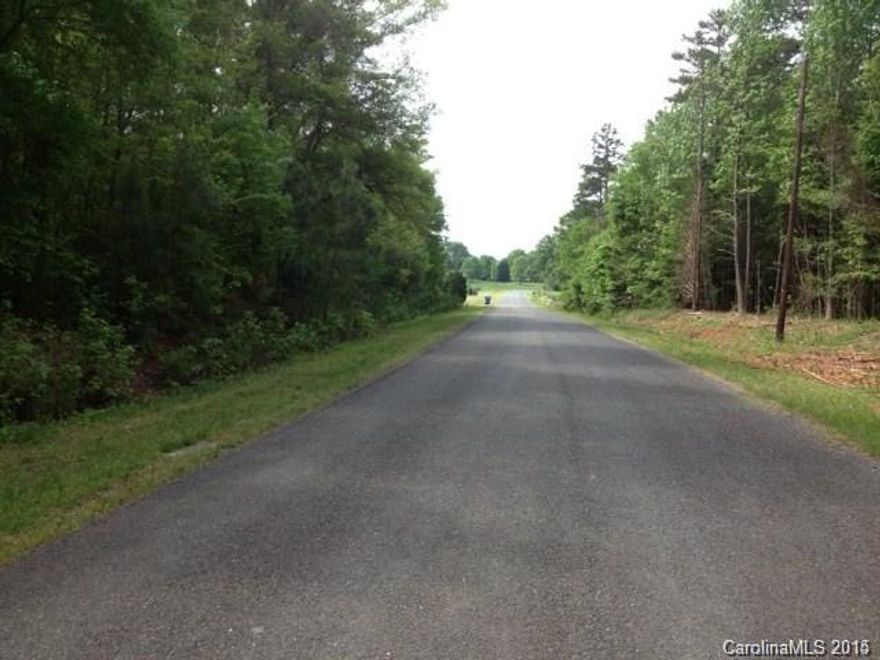 Located in the heart of horse country! Great 3 acre lot available partially wooded and open. Buyer will need new perk test. This is being taken out of total acreage of 4.22. The other 1.19 acre is directly across the street. Can be purchased separate or all together. Raymond Helms Road will dead end at the SugareeRanch.  See web site www.SugareeRanch.com for more info.