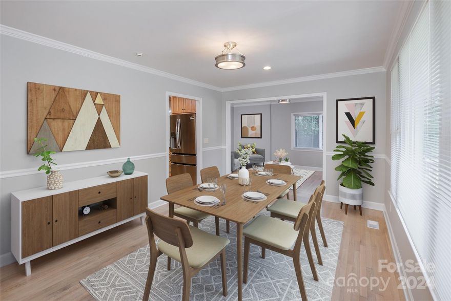 This charming home has so much love in it! Located in a prime and private spot close to uptown Charlotte, you'll enjoy both convenience and privacy.  It offers everything you've been searching for: 2 spacious bedrooms, 2 full large bathrooms including a luxurious primary bathroom with a large glass standup shower and dual vanities. You're greeted by a welcoming and spacious dining perfect for gatherings. The cozy kitchen features beautiful maple and top glass cabinets, granite countertops, and nice backsplash tile, complemented by brand new appliances: dishwasher, fridge, and microwave. The gorgeous, refinished hardwood floors and cozy fireplace, creating a warm atmosphere throughout. This home is ready for you to move in and start living. Recent upgrades include a new roof and HVAC in 2021, fresh paint. There's a separate 2-story insulated shed, about 520 sq ft completed with electricity and drywall for you to use as a studio, workshop, or extra storage, the possibilities are endless.