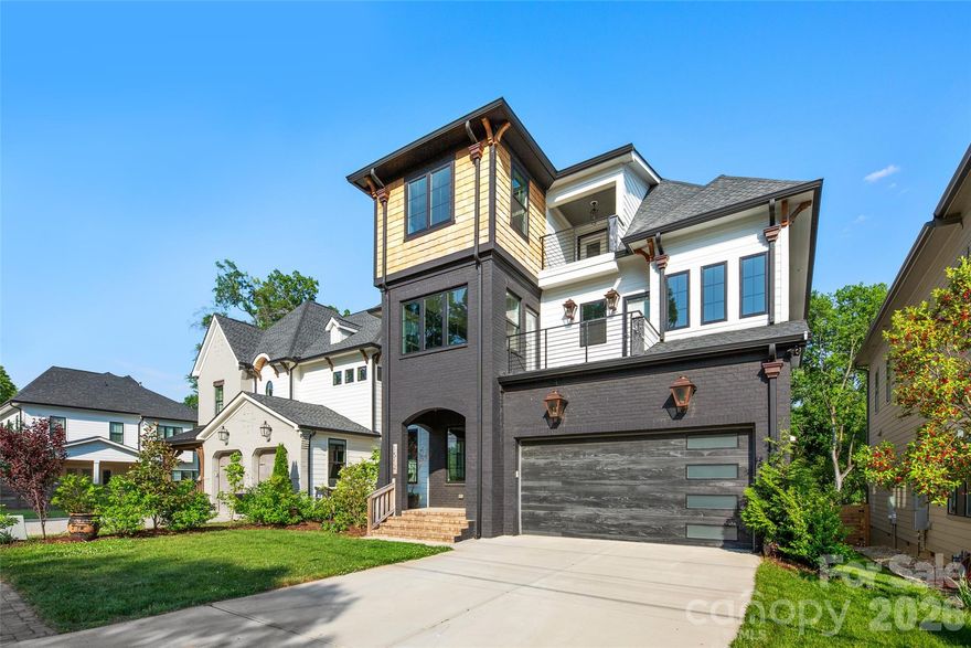Gorgeous Custom 5 bedroom home located in the vibrant & sought after Belmont Neighborhood.  Each room is curated with a unique & show stopping Restoration Hardware, Pottery Barn, or Serena & Lily Fixture.  This home will take your breath away, as soon as you lay your eyes on its grandeur curb appeal.  You are drawn into the beauty with custom woodwork ceilings & a large cedar mantle surrounded by gorgeous sconces in the living room.  The chefs kitchen is absolutely stunning including a butlers pantry with nothing left out including and not limited to Marble countertops, Marble backsplash, a La Cornue Stove, Free standing Subzero Refrigerator, Free standing Subzero Freezer, & Hoshizaki ice machine.  The expansive primary suite has an incredible walk-in closet alongside a spa ready bathroom with double shower heads for the couple, marble counter double sinks, & gorgeous marble flooring.  Kick off your shoes on your Extra-Wide plank, Solid wood, White Oak flooring and enjoy a relaxing moment under your covered deck fireplace staring off into your Large wooden Fenced in Yard.  A moment to treasure from every front deck and bedroom in the evening is the gorgeous Charlotte Skyline City view, Nothing was spared, down to the Woodbridge toilets and Navien tankless water heater.    This home will not last; it's not just a house it is truly a forever home ready to make everlasting memories.  Come and see for yourself!