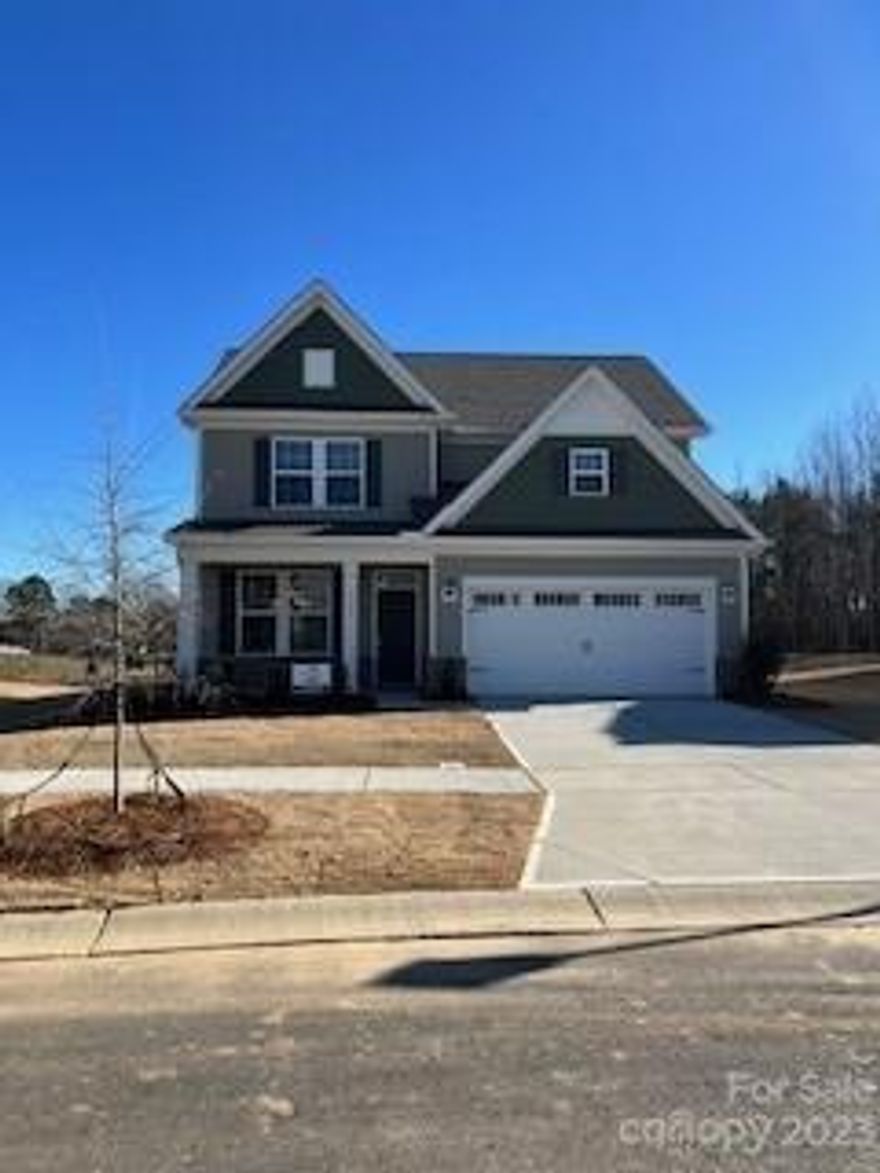 Welcome to Medlin Forest!! BRAND NEW Community in the beautiful town of Monroe. This spacious home offers four bedrooms, 2.5 baths, with the Primary Bedroom on the 1st floor! The Jordan also offers an open floor plan with 9 ft ceilings. The kitchen features an oversized eat-at island with plenty of cabinet and countertop space, which includes a huge pantry! This home is perfect for entertaining or gathering as a family. Enjoy your covered front porch and rear patio. Convenient to downtown Monroe with easy access to amenities! This home offers all the benefits of new construction.
