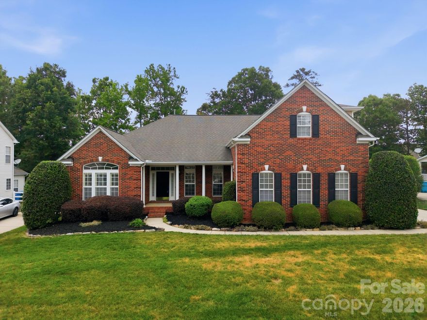 Located in the Chestnut neighborhood of Union County, this home has been refreshed and thoughtfully maintained with new interior paint throughout and a professional cleaning already completed. A covered rocking chair front porch welcomes you into a spacious entry, with a formal dining room positioned to the right. Hardwood floors and fresh paint extend across the main level. The living room features a vaulted ceiling, a gas log fireplace, and four oversized windows with transoms that bring in natural light. The kitchen offers generous cabinet and counter space, stainless steel appliances, a pantry, and an adjacent breakfast area. Just beyond, the sunroom is lined with large windows, creating a bright and comfortable space to relax. The primary suite includes a tray ceiling, new carpet, and an ensuite bath with dual vanities, an oversized walk-in closet, and a separate tub and shower. The main level also includes three additional bedrooms and two full baths. Upstairs, you’ll find a spacious bonus room, a fifth bedroom, and a fourth full bath, offering flexible living options. Outdoor features include lawn irrigation, an oversized deck that leads to a large patio, and a fenced, level backyard. Conveniently located just minutes from I-485, with easy access to grocery stores and dining.