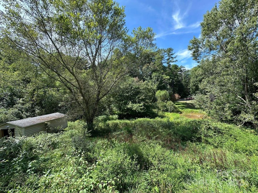 MULTIPLE OFFERS RECEIVED. BEST & FINAL DUE THIS FRIDAY, 9/20 BY 12PM. Charming Weaverville lot, tucked at the end of a dead-end street. This property is zoned R-3 per county records and already has a well and septic in place, simplifying your build or new home placement. It's already cleared but does need to be bush hogged. It currently has an old singlewide trailer on it that does have a title but is in very diminished condition. Seller is selling "AS IS" and will not be removing anything from the property. Great location, just minutes to Downtown Weaverville and only 15 mins to Asheville. Don't miss out on this great opportunity!