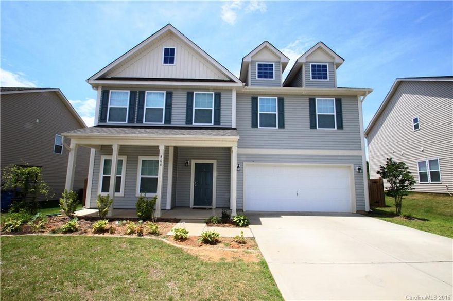 This 5 bedroom 3 full bath home features brand new laminate hardwood flooring on the main & second level.  The kitchen features granite counter tops, ceramic tile flooring and back splash, butlers pantry, & double stainless steel ovens.  Huge den with lots of natural light and surround sound speakers.  All bedrooms are very spacious. Master suite features sitting area, double vanity, shower, garden tub and a huge walk in closet. Whole house UV Light on the HVAC. Huge fenced in Backyard.