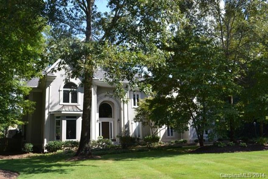 Custom built home with only 1 owner! Amazing outdoor living with salt-water pool, hot tub, slate patio, built in fireplace and grill overlooking large lake!  Updated granite kitchen and custom cabinets, work island, double drawer dishwasher, keeping room and breakfast area. Formal LR & DR, great room with fireplace, built-ins and wet bar. Stunning master bedroom & bath, sitting area overlooking lake. Office has built-ins, large bonus room with cedar closet.  Gorgeous hardwood floors. A must see!