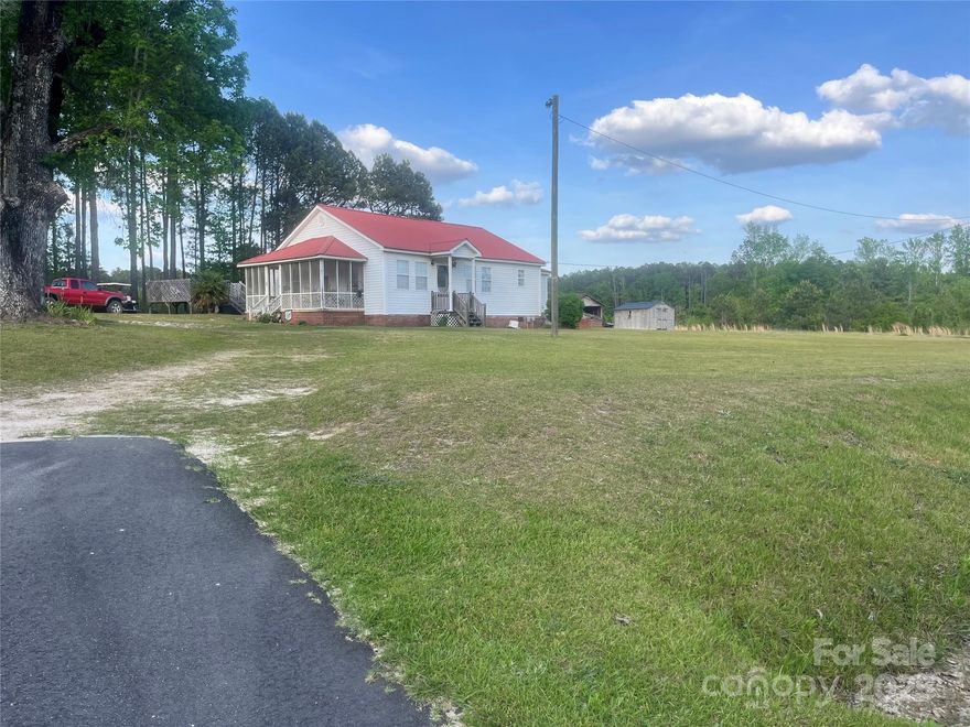 Absolutely adorable bungalow nestled on a spacious one-acre lot in the charming community of Jefferson, SC! This home would make a perfect starter or a great investment opportunity. Featuring new flooring and an updated master bathroom, it offers the perfect blend of character and potential—whether you want to make more updates or simply enjoy it as-is. With two bedrooms and two bathrooms, it’s cozy, full of love, and ready for its next chapter. This home has been in the same family since it was built—now it’s ready to welcome its new owners!