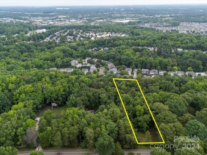 Looking to build your next home? This land opportunity provides a very deep lot in the heart of Steele Creek. The lot measures over 400 feet and is zoned R-3. Offering over 94 feet of road frontage. Enjoy a spacious acre lot with close proximity to Lake Wylie, River Gate Shopping Center, dining, medical facilities and a plethora of shopping. An easy commute to Charlotte Douglas International Airport, I-485 and I-77.