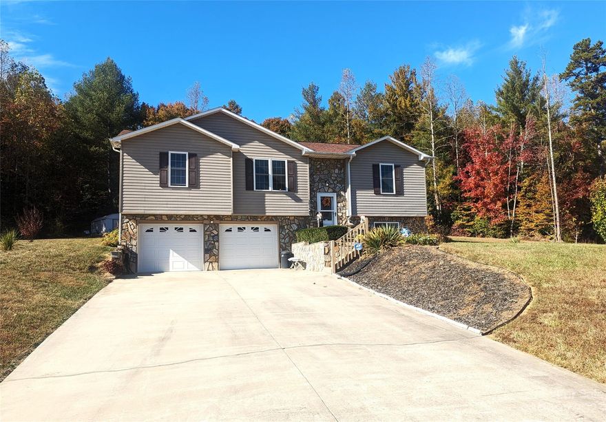 Built in 2015 by a local and highly respected contractor, this lovely spllit foyer home has been well built and lovingly maintained and sits on a 2.5 acre lot with no city taxes or HOA fees!  Gleaming hardwood floors grace much of the main level of the home which has a split bedroom floor plan.  The laundry room is conveniently located on the main level, just off the kitchen area. The kitchen boasts granite countertops and all appliances convey with the home.  Enjoy the views of nature from the comfortable sunroom or relax in the large lower level family room.  An additional 3rd bathroom has been added to the lower level for added convenience or potential conversion of the family room to a 4th bedroom area.  A special UV germicidal unit in the HVAC system, with a bi-annual transferrable service contract has been added to the home, giving the home the benefit of constant super clean, fresh air.  A transferrable termite bond is also included with the purchase of this like-new home.