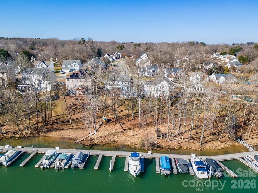 Beautifully situated on the Catawba River, this stunning home offers the perfect blend of comfort, space, and scenery. Enjoy your morning coffee or unwind with an evening beverage on the deck while taking in peaceful waterfront views. Ideally located near neighborhood amenities, with just a 5-minute drive to Downtown Mount Holly and only 9 minutes to Downtown Belmont. The spacious layout includes a full in-law suite in the basement complete with kitchen, laundry room, and bathroom perfect for guests or multi-generational living. With ample room for entertaining or quiet relaxation, this home delivers a true riverfront lifestyle. The views only get better as spring approaches. Welcome home