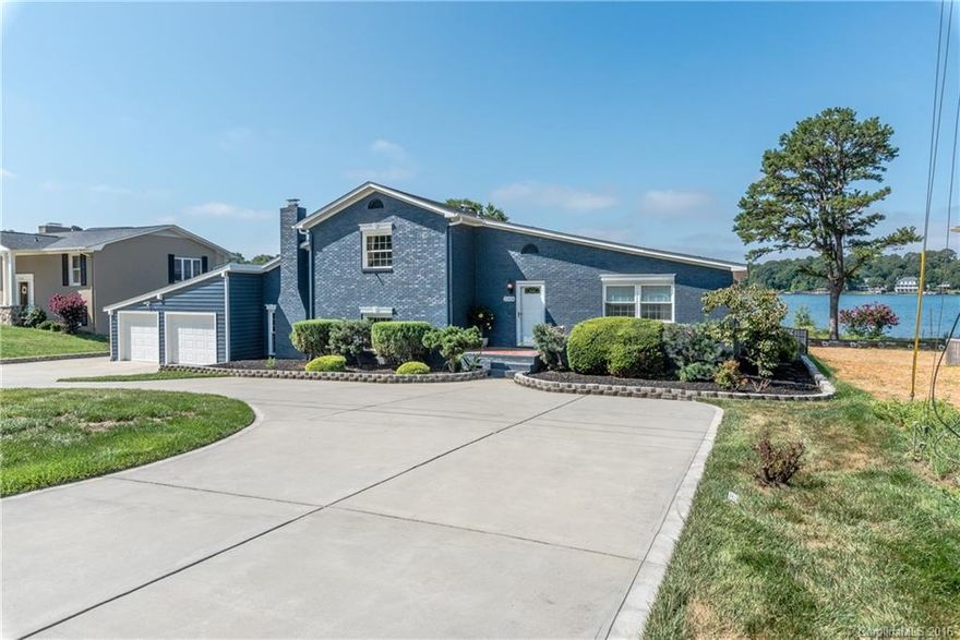 THIS LOVELY & UNIQUE WATERFRONT HOME OFFERS 4 BR/2.5 BA, OPEN FLOOR PLAN,OFFICE AREA, LARGE REC RM/BONUS, AND VIEWS GALORE! STEP OUT ONTO THE DECK/PATIO AND RELAX WHILE ENJOYING THE SUNRISE/SUNSET, OR PLAY IN THE HUGE FENCED, FLAT YARD, OR WALK OUT ON YOUR OWN PIER W/28 FT SLIP AND JUMP IN!! A 7000 LB CRADLE BT LIFT & SWINGARM JETSKI LIFT MAKE IT EASY TO COME AND GO BY LAKE & ENJOY ALL IT HAS TO OFFER. 2-CR GAR HAS A HG WORKSHOP-NOOK SPACE FOR SO MANY USES.  NO HOA! A MUST SEE HOME~WON'T LAST!