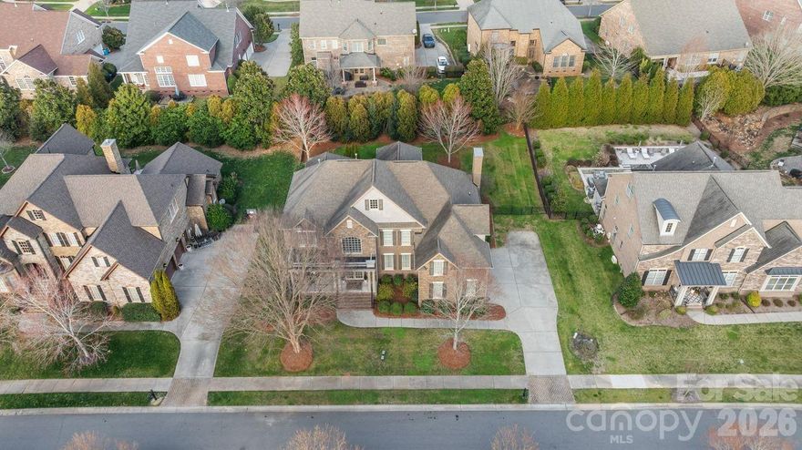 Award winning schools! Welcome to this stunning home designed for both comfort and unforgettable entertaining located in the quaint but vibrant Waxhaw area. This home is move-in ready. Greeted by huge covered front porch for morning coffee or evening gatherings. Grand two-story foyer with dramatic double staircase. Enjoy multiple functional rooms with ease of flow. Perfect office space or flex room on main with built-ins. Heart of the home features a kitchen with freshly painted cabinets, SS appliances, granite counter tops ample counter space and nice sized pantry. The large living room with two story-ceiling perfect for gathering, while cozy family room space is complete with fireplace and a view of the outdoors.  Updated lighting throughout including exterior. Spacious main-level primary bedroom offers privacy, two generous closet spaces and en-suite with freshly painted cabinets. New refrigerator 2025, new dishwasher 2023. Newly added hardwoods on second rear staircase and upstairs hallway. Upstairs you will find three additional bedrooms, each well-sized, and two full baths. Versatile bonus room ideal for a media room, playroom, or home gym.  Huge walk-in attic storage. Private fully fenced backyard with mature landscaping, paver patio and fire pit. Tucked away is a rear covered porch for peace and quiet. Sought after schools located within a community offering loads of amenities including Business Center, Club House, Dog Park, Fitness Center, Game Court, Outdoor Pool, Picnic Area, Playground, Pond, Recreation Area, Sidewalks, Street Lights, Tennis Court(s), Walking Trails, this home combines grand scale with thoughtful functionality.  Close to vibrant downtown Waxhaw, minutes from Waverly and 485. ***$10,000 seller incentive for buyer to be used as desired