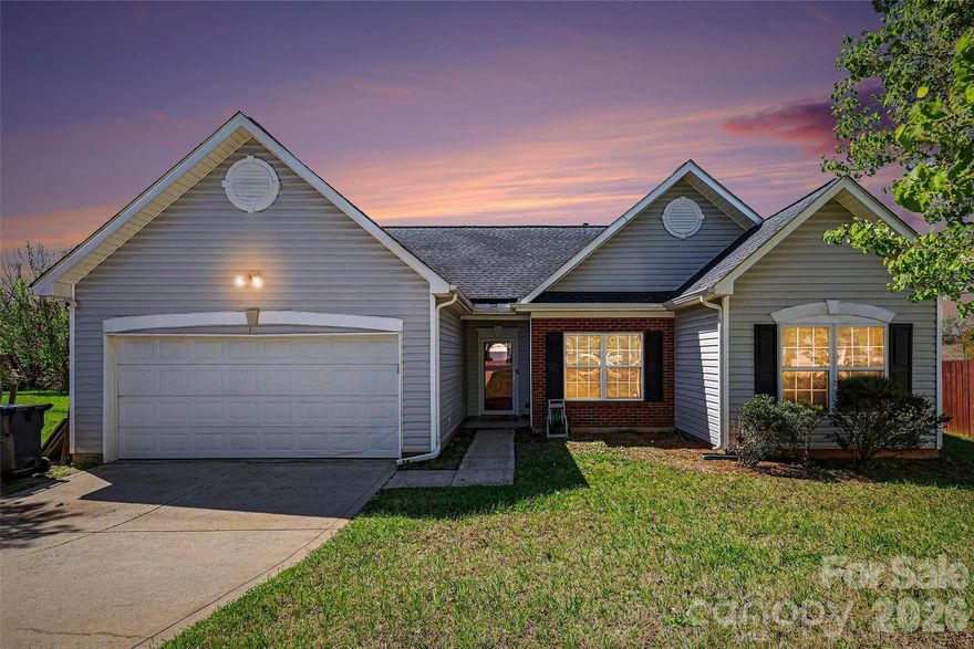 Welcome home to this charming ranch nestled on a quiet cul-de-sac in Charlotte! This well-maintained 3-bedroom, 2 full bath home offers the perfect blend of comfort and updates. The beautifully renovated hallway bathroom and updated kitchen provide modern touches, while major systems have already been taken care of with a roof replaced in 2019, gas furnace in 2023, and water heater in 2023.

The spacious primary suite offers a relaxing retreat with an en-suite bath featuring a separate shower and garden tub. Step outside to enjoy the private backyard oasis complete with a stoned fire pit and gazebo—perfect for entertaining or unwinding after a long day.
Conveniently located with easy access to shopping, hospitals, dining, and major highways, this home is a must-see!