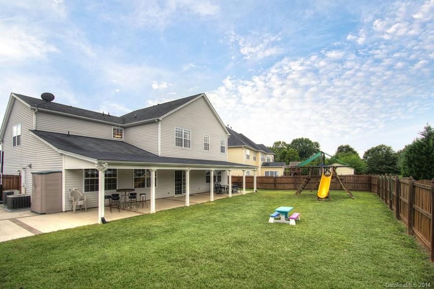 If you are looking a home to entertain in, look no more! This home is an AV lovers dream.  48x11 covered patio boasts 2 flatscreen tv's, in-ceiling speakers & fans overlooks flat yard w/ privacy fence.  Main level boasts formal DR, Office, GR and Rec Room/Bedroom 5. Wood floors, granite & recessed lighting. HUGE master suite w/ sitting room and GREAT closets.  Most of house freshly painted.  3 rooms have surround sound wiring (GR, main level rec room & bonus on upper level). Irr in front yard.