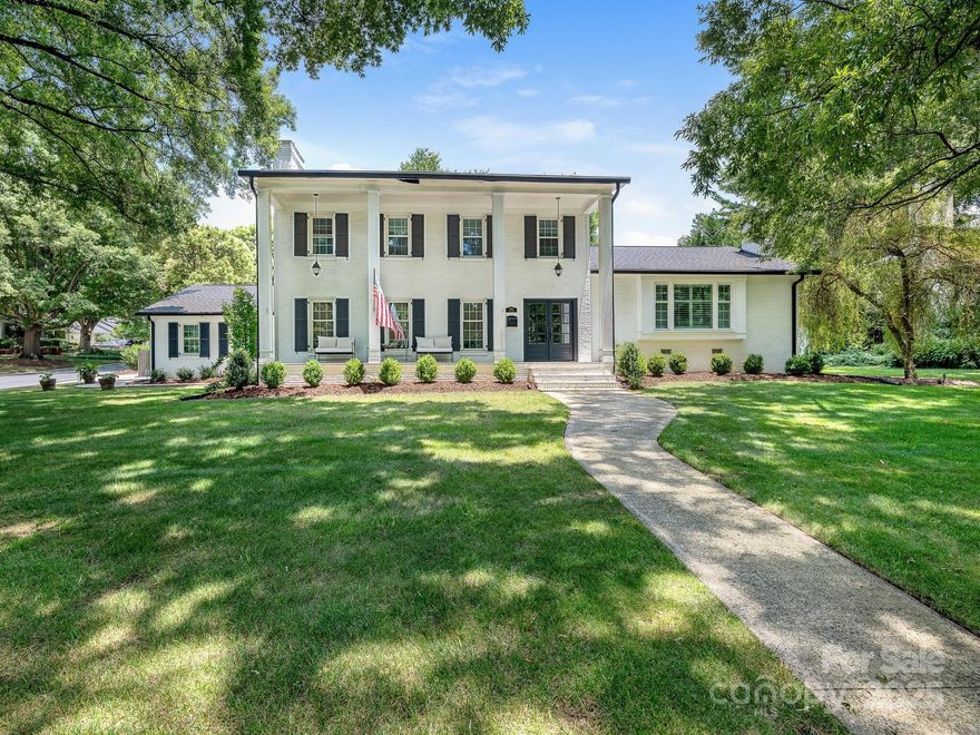 Nestled on a tree-lined street in Barclay Downs, this beautifully appointed home seamlessly blends timeless architecture with modern updates. Situated on a large, landscaped lot, this stately brick home offers a gracious layout ideal for everyday living and entertaining. Inside, sun-drenched living spaces feature hardwood floors and custom interiors. The kitchen features marble countertops, SS appliances, and oversized island that opens to the dining area. Striking steel French doors lead to covered patio and pool, creating an easy indoor-outdoor flow. The primary suite offers a fireplace, spa-like bathroom, and spacious walk-in closet with secondary laundry hookup. Upstairs, additional bedrooms are nicely sized with Jack-and-Jill bathrooms. The private backyard includes pool, covered patio, and a lush lawn—perfect for summer gatherings. A two-car attached garage and parking pad off Ferncliff provide convenience. Located just minutes from SouthPark and blocks from Myers Park/AG campus.