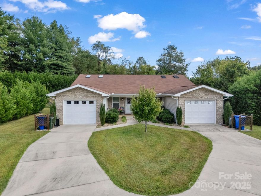 Rare investment opportunity in Hendersonville—this exceptional duplex community offers 20 total units across 10 well-built duplexes, plus an additional lot with infrastructure in place for an 11th duplex, providing the potential for future expansion. Each duplex sits on its own parcel number, offering flexibility for investors seeking long-term hold potential, resale opportunities, or condominium-style separation. Situated on approximately 4.59 acres, the property showcases thoughtful design, solid construction, and long-term care by the original owner/developer. Each residence features 2 bedrooms, 2 bathrooms, and a single-car garage, combining comfort, functionality, and privacy in a quiet neighborhood setting. The homes offer open-concept floor plans, spacious kitchens, primary suites, and inviting outdoor areas, appealing to both long-term tenants and those seeking low-maintenance living. Beautiful green spaces weave throughout the property, creating a park-like atmosphere that enhances tenant satisfaction and retention. The community is fully served by city water and city sewer and enjoys convenient proximity to shopping, dining, medical facilities, and downtown Hendersonville. With consistent occupancy, strong rental history, and evident pride of ownership, this property represents a turnkey investment with exceptional stability and future growth potential. Opportunities like this—featuring 20 income-producing units, garage parking for every residence, an additional duplex lot, and nearly five acres of landscaped grounds—are exceedingly rare in the Western North Carolina market. Whether you’re an experienced investor seeking a well-diversified asset or a developer looking for expansion and resale flexibility, this meticulously maintained duplex community offers enduring value in a prime Hendersonville location.