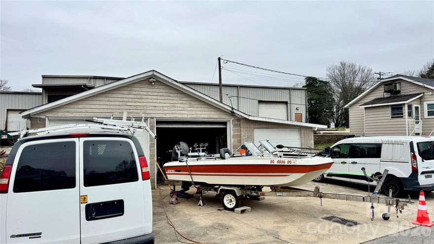 This is your chance to own a fantastic home in the Conditional Zoning District of Kannapolis, ideal for light commercial and office use. It features new laminated flooring, all new window blinds, new windows, and a recently installed HVAC system. The home boasts two spacious bedrooms and a nice-sized full bath. The kitchen has been updated with a new stainless steel stove and refrigerator, a double stainless steel sink, a backsplash, and granite countertops. The cozy living room offers ample natural sunlight, while the covered front porch provides a perfect spot for relaxation. The over-sized detached three-car garage offers ample storage space, making it an ideal workshop area with outdoor parking for up to six cars. The home’s prime location is close to the heart of Kannapolis, providing easy access to I-85 for quick travel to your desired destinations. Don’t miss out on this incredible opportunity to own a home that could be your business or forever home. Come and see for yourself!