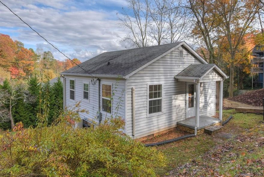 Make your appointment today to see this cute bungalow at Lake Junaluska! Newly renovated throughout. 2 Bedrooms; 2 Baths; Living Room; Beautifully refinished hardwood floors on main.  Downstairs is updated Kitchen with new energy efficient modern Appliances; newly tiled floors. New windows; new energy efficient HVAC.  This is the perfect Junaluska starter home, vacation home close to Lake activities, or income producing rental.
