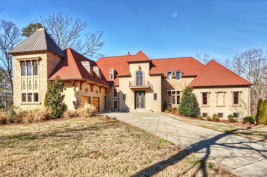 Opulent European mansion in prestigious gated neighborhood, Stratford on Providence in Weddington. Every upgrade imaginable! Walk on teak floors throughout main living area. Gourmet kitchen of your dreams with 6 burner gas cook top with grill & pot filler, 2 fridges and every convenience you can imagine.  Mstr bdrm and bath will leave you speechless.  Basement has family, rec, media and wine room + other spaces to customize.  Elevator will take you to all 10,000 feet of this unbelievable home!