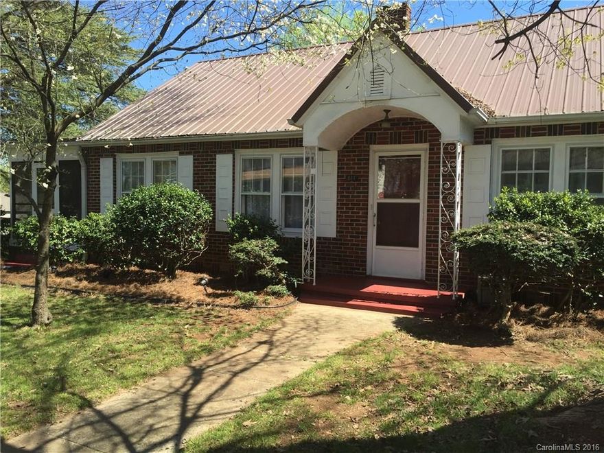 ROMANTIC WANTED to appreciate this Vintage 3 Bed, 1.5 bath with its unique charm & warmth. You'll fall in love with the Gleaming Hardwood Floors, High Ceilings, Bright Large Rooms, Formal dining & Breakfast Nook, Rare Architectural built ins & Mouldings, attached garage with separate work shop room, screened summer porch, newer metal roof, updated systems combining the best of today with the charm of a gentler time. Nestled amid mature,  flowering trees & shrubs. Buyer closing costs available.