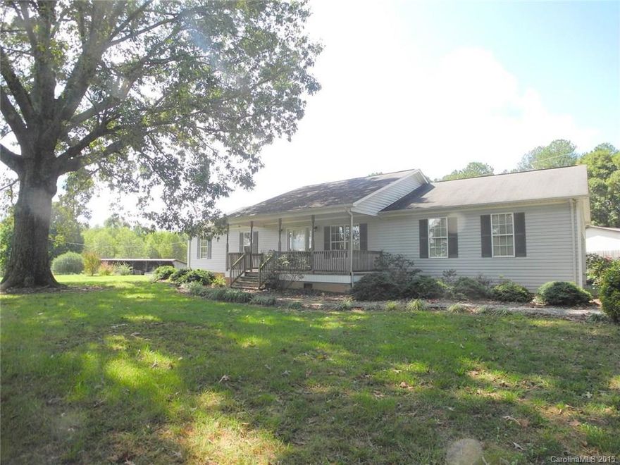 A lovely place, not far off the beaten path; nestled off the road, you will find a perfect spot for your tree swing. A front porch w/ space to sit & rock, play games & enjoy a glass of tea.  A deck out back for grilling & a 19x19 living room, for those inside gatherings.  Enough cabinet space for everything you have & counter space galore.  Very spacious 15x15 Master Bedroom. Priced under tax value & at $92.00 a sq ft one of the best buys on the market.  15 minutes to Lincolnton or Hickory