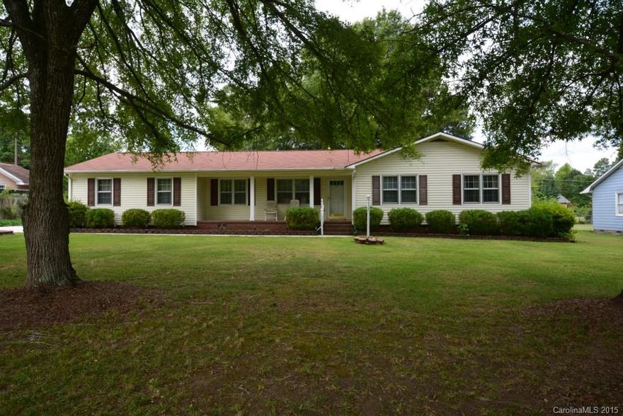 Ready for your personalization! Newer HVAC, roof water heater and driveway.  3 bedrooms, 2 baths, 2 car attached garage. 3 separate large storage buildings in back - perfect for a handyman. Workshop in garage as well. One owner home ready for your updating.  Gorgeous half acre lot.