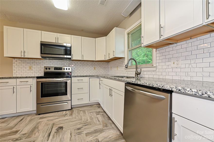 PREVIOUS BUYER'S FINANCING FELL THROUGH.  This lovely full brick two bedroom one and a half bath home has had several upgrades.  White cabinets with granite counter tops and tile back splash create a wonderful kitchen and dining area.  The great room is spacious with a bay window for natural light to enhance the areas.  There is a main bathroom in the hallway and primary bedroom has half bath.

NOTE:  NO Investors.  Community is at 20% rental capacity.  Owner Occupants only.