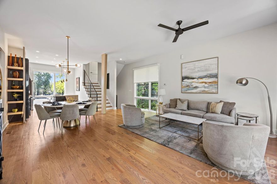 Ideally situated in the heart of Dilworth, this exceptional 3-bedroom, 3.5-bath end-unit townhome offers refined urban living with unmatched walkability. Thoughtfully designed with spacious interiors and abundant natural light, the home features hardwood and tile flooring throughout, along with en-suite baths for each bedroom, creating both comfort and privacy. The coveted end-unit placement enhances both light and livability, while a private one-car garage adds everyday ease. Enjoy skyline views from the 4th floor rooftop terrace.  Just outside your door, enjoy effortless access to Dilworth’s premier dining, shopping, and lifestyle amenities.  This unit is priced to sell as a main home or investment property with one of Charlotte's major hospitals just across the street.