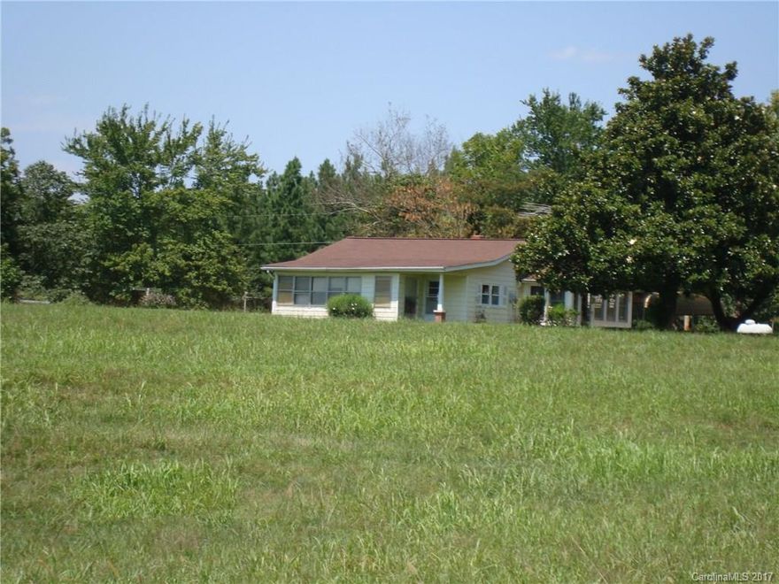 Beautiful 5.49 ac parcel with long-range mountain views. Land is mostly level & has a lush, well-established field of grass along the front with approx. 400' frontage on Hwy 108 near Pea Ridge Road intersection. Handyman Special 3 BR, 1 BA home has a full unfinished walk-out basement. Work on house around 2015 included: new HVAC, Septic Pumped, new well. House is being sold As-Is. There is a workshop/storage building behind the house. Close to local winery/vineyard and only 5 minutes to TIEC.