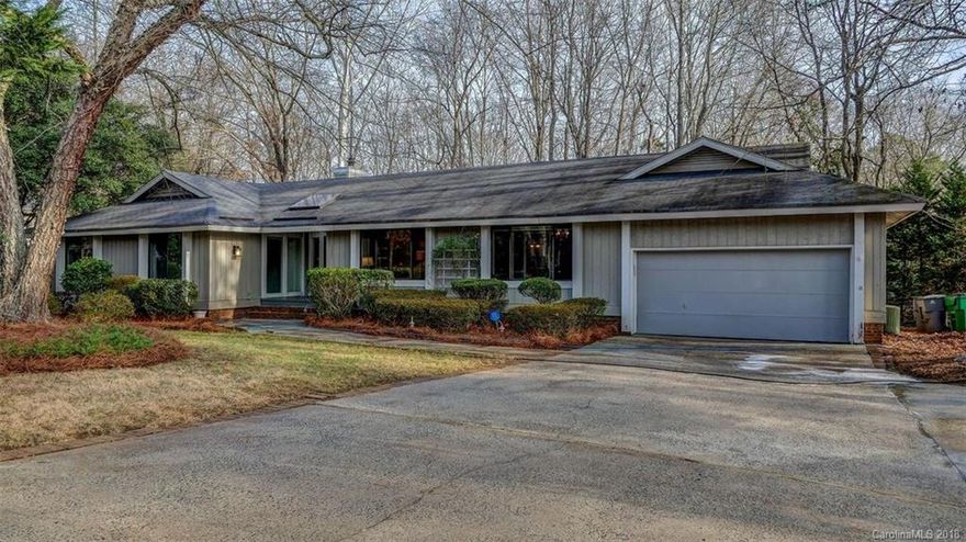 Beautiful ranch style home on a large wooded lot with plenty privacy. An open floor plan allows you plenty of options with furniture layouts and a great wet bar for entertaining. This home also features a large laundry room with plenty of storage and shelving. Master bedroom walk out onto the back porch with plenty of privacy from the mature landscaping.