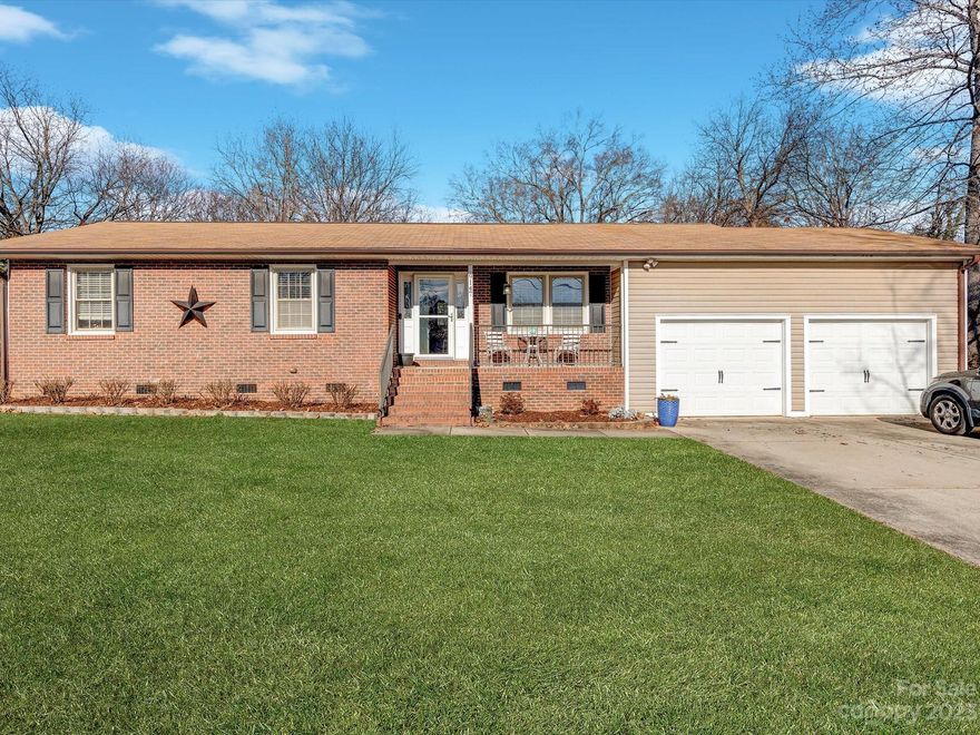 Nestled on a generous .71-acre lot, this three-bedroom, two-bathroom gem is a perfect blend of style and comfort. As you step inside, be greeted by the fresh and inviting atmosphere created by the recently applied neutral paint colors, setting the tone for a home that radiates warmth. The heart of this residence is undoubtedly the well-appointed kitchen, boasting a kitchen island, stainless steel appliances, and luxurious quartz countertops. Step outside to discover your own private oasis in the form of a beautiful fenced-in backyard. Imagine summer barbecues on the deck with a pergola, offering the perfect spot to unwind and enjoy the outdoors. The expansive yard provides ample space for gardening, play, or simply soaking in the natural surroundings. The two-car garage ensures convenience and additional storage options. Easy access to 485 and 77 for commuting. No HOA.