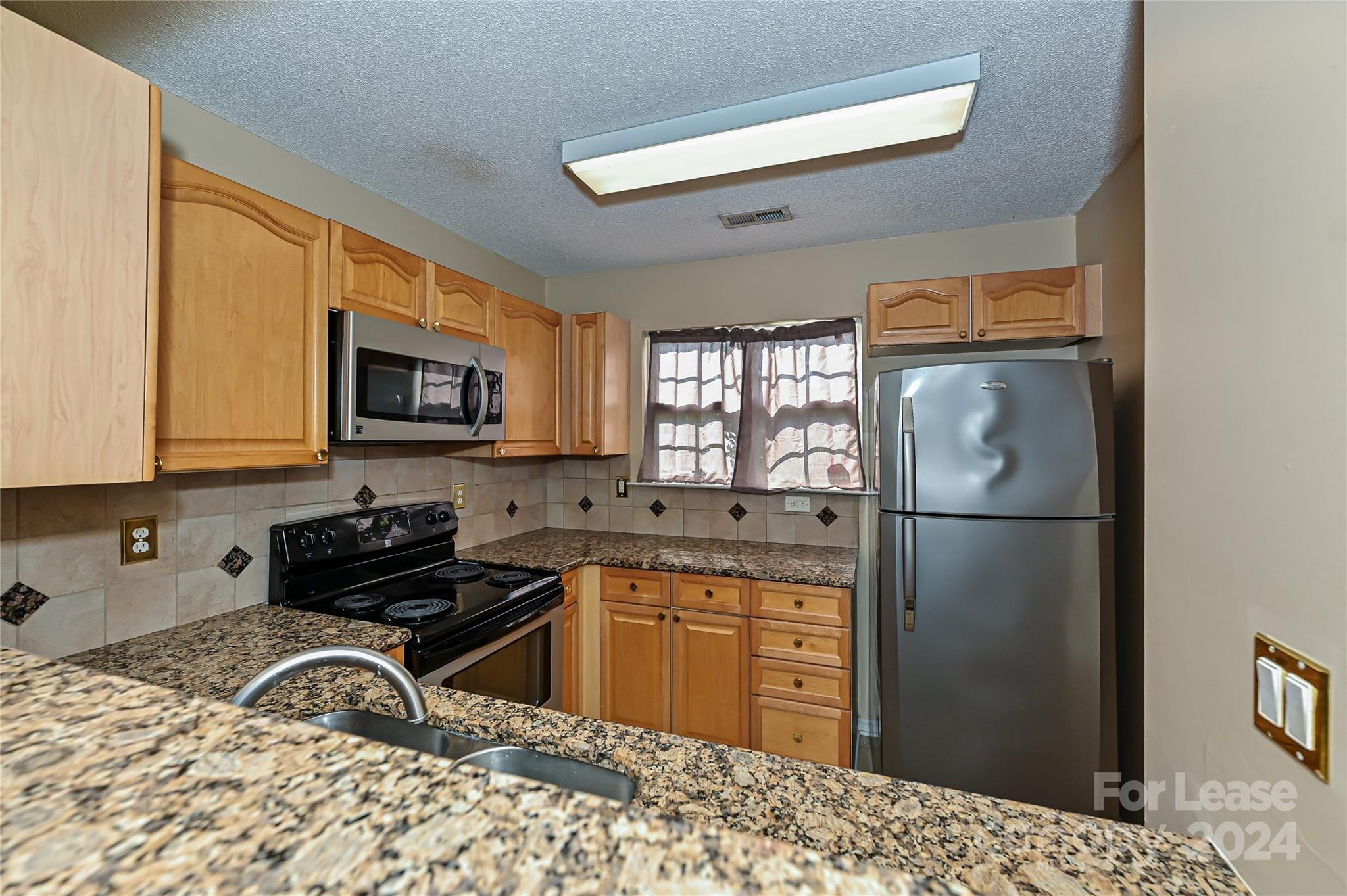 Melrose Townhomes - Residential Lease