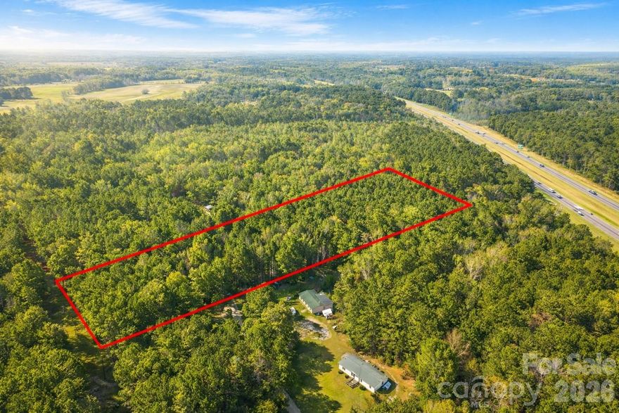 3.60 acres in eastern Cumberland County with confirmed 3-BEDROOM SEPTIC CAPACITY — licensed soil scientist report on file (Southeastern Soil & Environmental Associates, dated August 2025). NOT in a FEMA flood zone. Public road frontage on Nuffield Rd (~177 ft).

Zoned Rural Residential (RR). Permitted by right: site-built homes, Class A manufactured housing, agricultural use. No HOA. No known subdivision restrictions.

Seller will consider owner financing with acceptable terms to qualified buyers.

Location: Eastover-Armstrong-Stedman growth corridor east of Fayetteville. Cape Fear High School district. Approximately 14 miles to downtown Fayetteville, 20 miles to Fort Liberty main gate, 15 miles to Fayetteville Regional Airport. Approximately 65 miles to Raleigh.

Buyer will install private well and septic. The soil scientist report supports a 3-bedroom single-family residence with initial + repair areas identified. Final septic Improvement Permit from Cumberland County Environmental Health is required before construction, or under GS 130A-336.2 via a licensed Authorized On-Site Wastewater Evaluator.

PROPERTY DETAILS
- Address: 0 Nuffield Rd, Fayetteville, NC 28312
- County: Cumberland
- APN: 0456-41-8515
- Acres: 3.60
- Approximate dimensions: 177' × 918' × 180' × 918'
- Zoning: RR Rural Residential

NEARBY CITIES
- Raleigh, NC — ~65 miles
- Durham, NC — ~75 miles
- Wilmington, NC — ~90 miles

NEARBY AIRPORTS
- Fayetteville Regional (FAY) — ~12 miles
- Raleigh-Durham International (RDU) — ~70 miles
- Wilmington International (ILM) — ~95 miles
- Charlotte Douglas International (CLT) — ~140 miles

NEARBY ATTRACTIONS
- Cape Fear Botanical Garden — ~9 miles
- Downtown Fayetteville — ~10 miles
- Fort Liberty (Fort Bragg) — ~18 miles
- Raven Rock State Park — ~35 miles

Full 7-page Property Overview with comparable sales, zoning detail, and county contact information available on request.