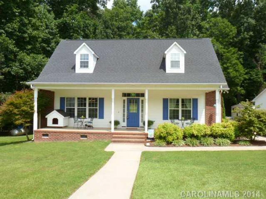 Country living at its best only min from town. Setting on 12 beautiful acs of mostly white oaks, and other hardwoods. All the privacy you want. This 1.5 story Cape Cod home has mbr on the main with 2 lg br's on the second floor with 2.5 ba's. Large family room with fireplace opens up to the dining room and large kitchen with new granite counter and back splash all accented with molding & hardwood.