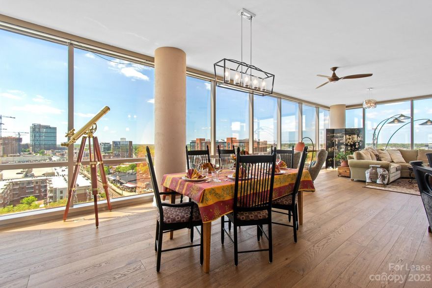 This luxury condo in SouthEnd offers the best of urban living and stunning city skyline views. With 2 bedrooms and 2 bathrooms, this meticulously crafted condo boasts engineered hardwood, SS appliances, and slide-out cabinets. Enjoy the natural light from floor-to-ceiling windows (decked out in motorized roman shades), and entertain on the TWO balconies offering incredible views. The primary bedroom features a custom-designed closet and premium en-suite bathroom finishes. Just a short walk to the light rail, this condo offers easy access to Charlotte's best, including a rooftop pool, terrace, and gym. Don't miss this opportunity for a stylish, comfortable, and convenient living experience in a sought-after neighborhood!