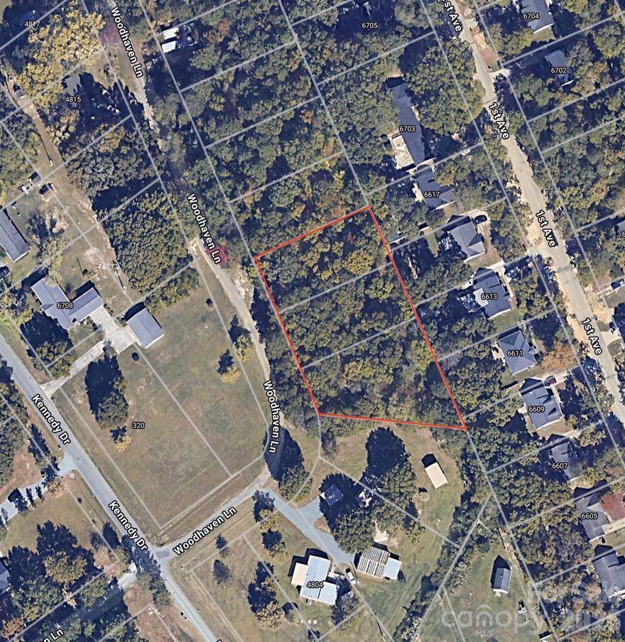 .82 Lot In Great Location In Indian Trail. 3 Lots combined after the seller bought it and he obtained a survey. This lot will require approval from the Town of Indian Trail to build a road on Woodhaven(Road is dirt now) to be able to build a home. Great opportunity !  Lot #29,30,31