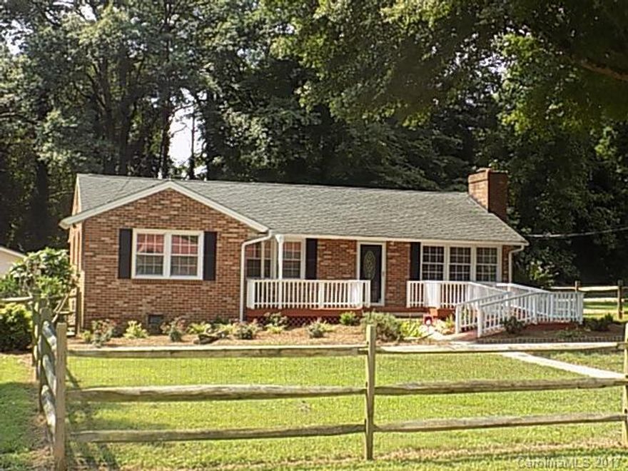 This full brick ranch home boasts 4 bedrooms and 3 full baths ! Hardwood floors and lots of recent renovations with two new bathrooms, fresh paint and brand new SS appliances. Decks on both the front and back of the house to enjoy the outside and a massive 728 sq ft detached garage/workshop with electric service offers plenty of storage and room for the handyman. Fenced yard ideal for your pet to roam. Easy access to I-85 close by, 10 mins to downtown Kannapolis and the research campus.