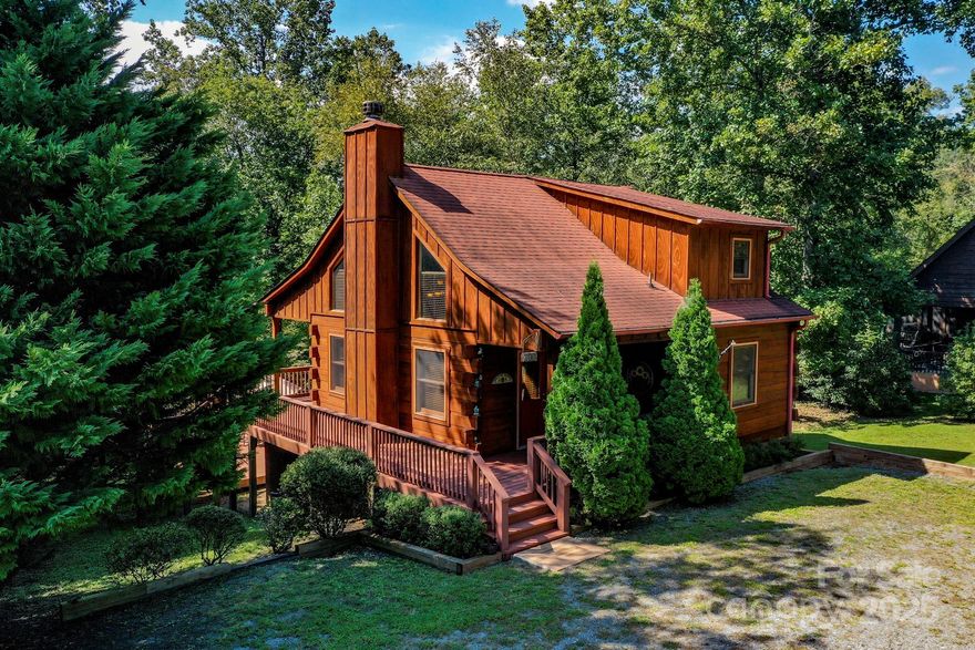 RIVERFRONT 2 bedroom, 3 bath home just 5 minutes from beautiful Lake Lure, NC. Situated on the Broad River, this immaculate home would make the perfect mountain getaway or vacation rental property. You'll enjoy the 19 ft vaulted ceilings, woodburning fireplace and an abundance of outdoor living space......all overlooking a large lawn that goes down to rivers edge. Comes furnished and priced to sell at $405,000. This home did have some water get in the basement during our 1000 year Helene storm, but is already back in pristine condition.