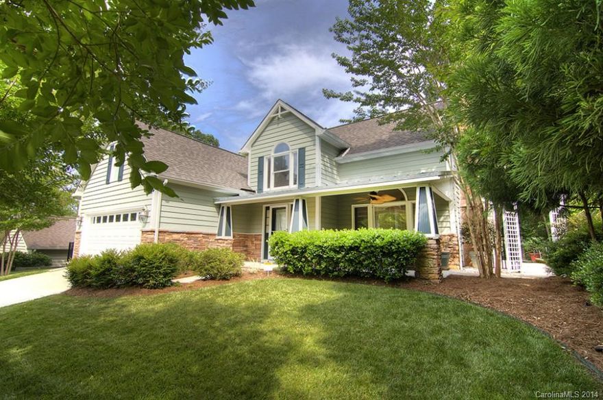 Charming curb appeal, private setting, beautiful custom features and upgrades.  This house offers it all, custom trim work, hardwood flooring, updated custom baths, kitchen and gorgeous backyard.  Enjoy the quiet privacy, large master suite, spacious bonus room, and pretty front porch.  Located on a culdesac street within easy walking distance to parks, golf, trails and more!  Tega Cay vacation lifestyle, Fort Mill Schools, easy access to major freeways and shopping.