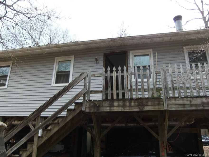 1.76 Acres, 3BR 1BA in Booming Indian Land. Great 2nd home,  Investment Property or First-time home owner that wants land with no HOA. House overlooks a pond on neighboring property. A nature lovers dream. Kitchen/Dining Open to Living Area, Sliding Doors to Deck, Old Fashion Claw-foot Tub w/shower, plumbing for another bath, workshop,  Not in a subdivision. Minutes to shopping & schools. Low SC Taxes, Great Indian Land Schools.