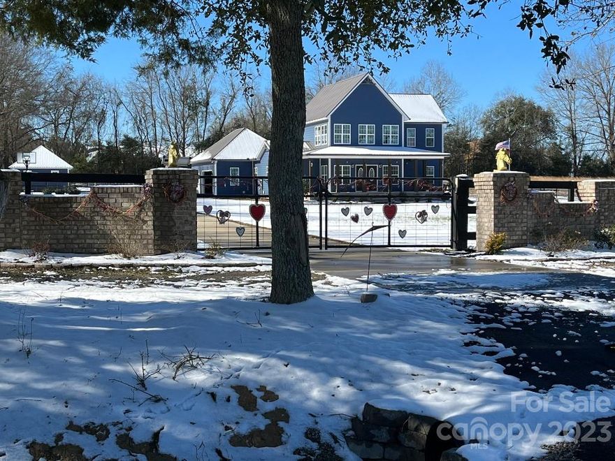 Back on the market due to buyers financing .Custom-built Home in desirable area. Luxury & Practicality. 3 Spacious Bedrooms & 2 Well-appointed Bathrooms,  The Exterior has Metal Roofing, Complete W/ Gutters, & Nestled On A Sprawling 2.03-acre Secured By Solar-powered Gates. Located Outside Historic Charming Town Of Camden, The Open Floor Plan w/Hardwood Flooring, 9-foot Ceilings, & A Central Vacuum System For Added Convenience. Primary Suite, is On Main Level, w/Box Ceiling, A Custom Walk-in Closet Featuring Built-in Drawers & Shelves, Double Vanity, & tile Shower. Upstairs, 2 Additional Bedrooms, Each W/Ample Walk-in Closet, Share, w/Bathroom. Kitchen has Top-of-the-line Jenn-air Appliances, Granite Countertops, Tile Backsplash, Gas Cooktop, Built-in Microwave, Warming Drawer, Farmhouse-style Stainless Sink, Pantry. Outside find a Fiberglass Saltwater Pool w/lighting, fire pit, Substantial 22 X 18 Detached workshop. Sprinkler & well water system. Crawl space encapsulated!!!!!!