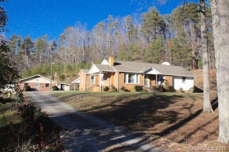 19 acres and PRIVACY. The property is within 5 minutes of downtown Forest City, yet quiet and secluded. The house is a 3/2 and has had a kit/den addition and a two br addition. The roof shingles are new in 2012. A creek runs along one long border. There are multiple outbuildings. One is a 30 x 50 workshop with two 12 x 20 sheds attached, electric, heat and a window a/c unit. There are equipment sheds and there is another workshop that is 18 x 28.