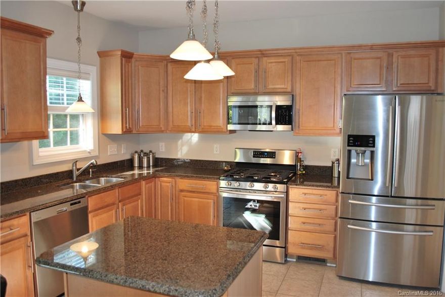 Ballantyne! Large kitchen w/adjoining fireplace greatroom. Private 10 x 20 deck overlooking woods. Feels private and spacious. 2 car garage, Master bed with garden tub and dual vanities, separate shower. Gigantic storage in crawl space area under house. Full height. Fridge does not convey with sale. House is a GREAT Location & a Must see! Walk to Ballantyne Village for Brunch, Dining, Shopping and/or coffee! Sellers have family members with NC RE licenses.