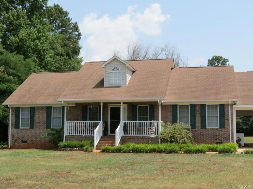 Wonderful well-kept home on large private lot with a great location to shopping and dining. Interior features a split BR floor plan with a large family room w/vaulted ceiling, hardwood floors and gas fireplace. Master bedroom features large master bath and walk-in closet. Dinette area has patio door leading to back deck. Relax on the nice covered front porch to enjoy the quiet neighborhood or sit on the back deck and enjoy the private yard with tall hardwoods on the side and back of the lot.