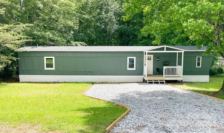 You must come see this adorable, de-titled, completely remodeled home. This home has a new roof, new cabinets, and countertops, (in both the kitchen and the bathrooms) new flooring, fresh paint. This list goes on. It sits on almost a half-acre of land with NO HOA. Best of all, you can enjoy the private, country feel on your new front porch and yet be only 2 miles to Walmart and Lowes.