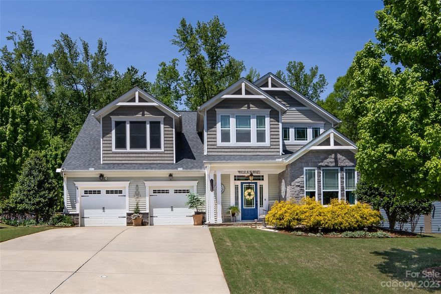 Beautiful, 2-story on almost half-acre gorgeous perennial filled lot in sought after Shelly Woods! Wonderful location convenient to Ballantyne & Fort Mill, w/plenty of shopping & restaurants nearby. Home features a Lovely foyer w/Office, or formal Living Room. The Dining Room opens to large Great Room w/ gas fireplace. Well appointed cooks Kitchen w/large center island, roll-outs, granite countertops, & stainless steel appliances. Primary Suite is located on main w/walk-in closet, garden tub, & double vanity. Upstairs are 3 Bedrooms & jack n jill bath, plus a Loft AND huge Bonus Room. Home is full of upgrades including whole house carbon water filtration system, She Shed, Fenced yard, Sprinkler system w/ yard hydrant, new carpet in all bedrooms, whole house surge protector and HVAC surge protector.  Lovely private yard that backs up to woods!  Community features a pool, clubhouse, play area & pond. Plus a large public park across the street as well. This home is a must see!
