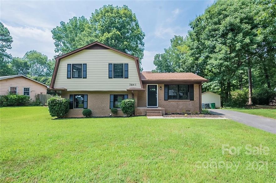 This Charlotte two-story cul-de-sac home offers granite countertops.
