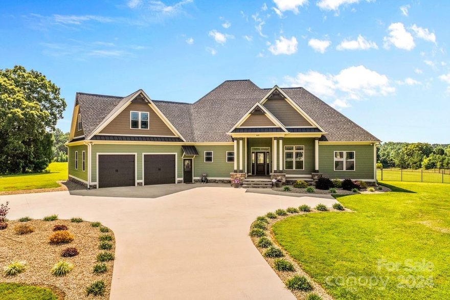 Welcome to a stunning private estate on 43 acres in Rowan County, near shopping and entertainment. This one-owner, custom-built home is impeccably maintained, featuring 3 BRs, 2.5 baths and 2,700 square feet of luxurious living space. The living area overlooks an outdoor paradise w/saltwater pool, covered porch, grilling patio with a built-in gas grill, outdoor fireplace, and a 611-square-foot pool house w/kitchen and bath. The chef's kitchen boasts granite countertops, soft-close cabinets and ample storage. The primary suite offers spa bath w/double vanity, walk-in shower & air jetted tub. An office with built-in cabinetry provides serene views, and the oversized bonus room is perfect for multiple uses. The estate features a 2 car attached garage, 2-car and 3-car detached garages and an 1,800-square-foot RV garage/workshop. Generator ready! You'll also find a spring-fed stream, fenced pasture and shooting range area. Schedule your showing today & discover all this estate has to offer!