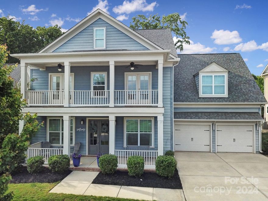 Welcome to this gorgeous 5 bedroom, 4 bathroom Charleston style home where functionality meets elegance. With an open floor plan, the living, dining & kitchen areas flow seamlessly, ideal for daily life & entertaining. Featuring designer lighting, wood floors & soaring ceilings. The chef's kitchen boasts stainless steel appliances including a wall oven, a five-burner gas cooktop, hood & a large quartz island. Butlers w/ wine fridge. Upstairs, a loft area is perfect for a home office or flex space. The primary bathroom is a wow factor w/ sparkling quartz countertops, a tile spa shower & a soaking tub. Step onto the 2nd-floor balcony, accessible by the loft & bedroom and enjoy the front porches or back patio for outdoor relaxation in the hot tub or by the fire pit. The large backyard provides ample space for activities. Oversized 2 Car Garage. Bridgemill offers rich amenities including a clubhouse with fitness, 2 pools, tennis, basketball, sand volleyball, dog park & more. Low SC Taxes.