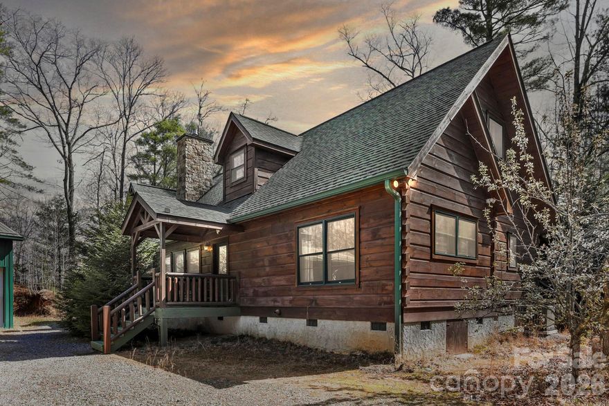Awesome, unrestricted log home with NO HOA in an unbeatable location! Hop to Brevard, Hendersonville, or Asheville in minutes, with the Asheville Airport aprox 15 minutes away. Mountain bikers will love having the Turkey Pen trailhead right around the corner or Pisgah National Forest only minutes away. This 3-bed, 3.5-bath home features a welcoming covered front porch, an attached car garage, and a huge upstairs layout that includes two bedrooms, two full baths, and massive flex space for a den, office, or game room. A huge 30X40 outbuilding/shop adds incredible value and even more storage space. The side yard is fenced for your pets.Currently operating as an active short-term rental with great income potential, this cabin is a perfect fit whether you want an investment property, a vacation home, or a full-time mountain residence. Listed below tax value. Showings are highly limited due to active rental bookings. Schedule your showing today! Please, no drive-bys. Appointment required.