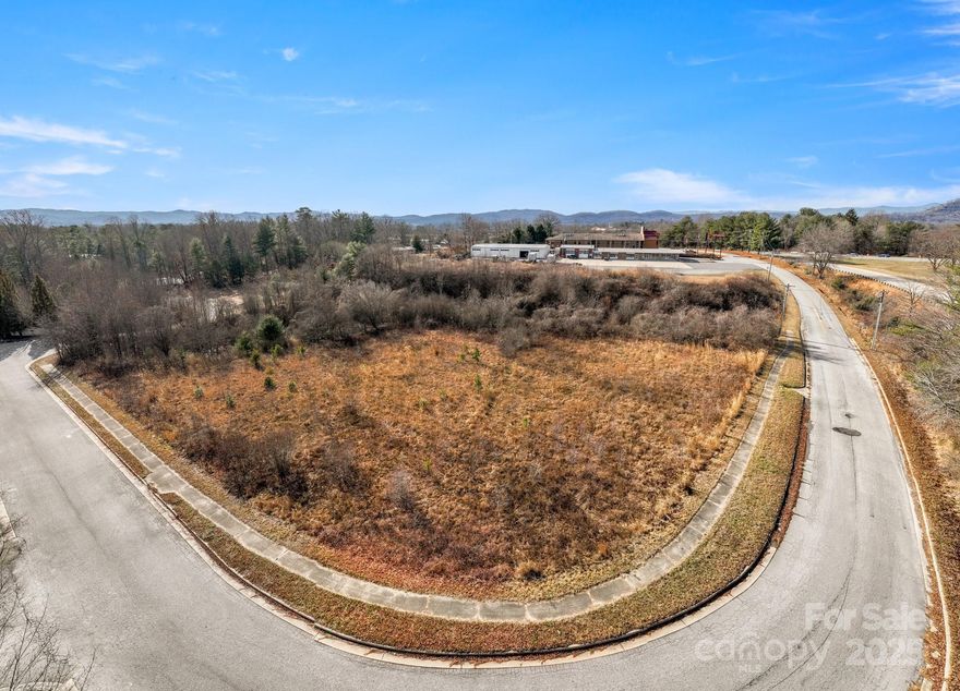 Prime commercial investment opportunity poised for development in ideally situated Opportunity Zone with optimal access to 2 major highways. 2 parcels totaling 3.32 acres. Situated in fast-growing Henderson County, NC between Asheville, NC and Greenville/Spartanburg, SC, this property is surrounded by large national retailers and is shovel ready to take advantage of current and perspective growth.  Land is ready to build, including City sewer, 3-phase power line that is underground, gas line, City water line and fiber optics already in place. C-3 zoning allows for a variety of commercial opportunities. Just 5 minutes from historic downtown Hendersonville, this community attracts approximately 2 million tourists per year and has grown its population by nearly 12% over the last 5 years.