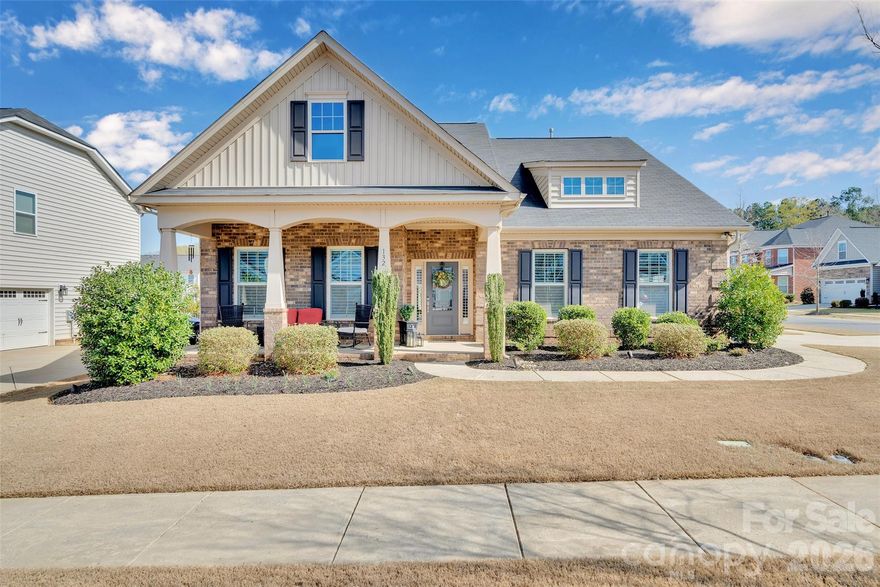 Beautifully maintained 4-bedroom, 3 full bath home featuring a highly desirable primary suite on the main level and a spacious open floor plan designed for comfortable everyday living and entertaining. The kitchen is the heart of the home with granite countertops, 42-inch cabinetry, and abundant cabinet and storage space, seamlessly flowing into the inviting living area highlighted by a gas fireplace. Elegant plantation shutters throughout add timeless style and natural light control. Upstairs offers 2 additional bedrooms and a large loft, perfect for a media room, home office, or flexible living space. Step outside to a thoughtfully designed backyard retreat featuring a stamped concrete patio, professional landscaping, low-voltage landscape lighting, and drip plus full irrigation systems to keep the yard looking its best year-round. A utility shed provides additional storage, while the insulated garage adds efficiency and convenience. Residents also enjoy access to a community pool, providing a great place to relax and connect with neighbors. Ideally located with close proximity to Lake Wylie, as well as nearby shopping, dining, and medical facilities, this home offers the perfect blend of comfort, convenience, and lifestyle.